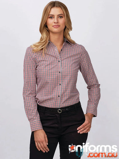 Woman wearing Hudson Identitee L/S Shirt in black white checkered workwear style