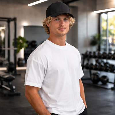 Icon trucker cap in black with curved cotton peak brim
