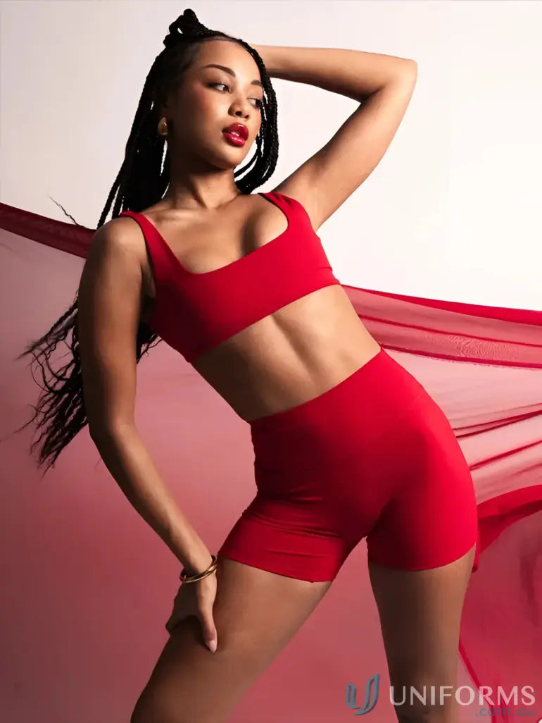 Red athletic two-piece set with invisible scrunch for stylish uniforms or workwear