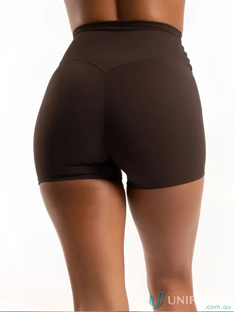 Brown high-waisted athletic shorts with invisible scrunch for uniforms and workwear