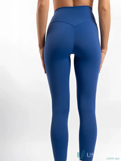 Blue high-waisted leggings with invisible scrunch for uniforms and workwear by Invicible Scrunch Riviera Leggings