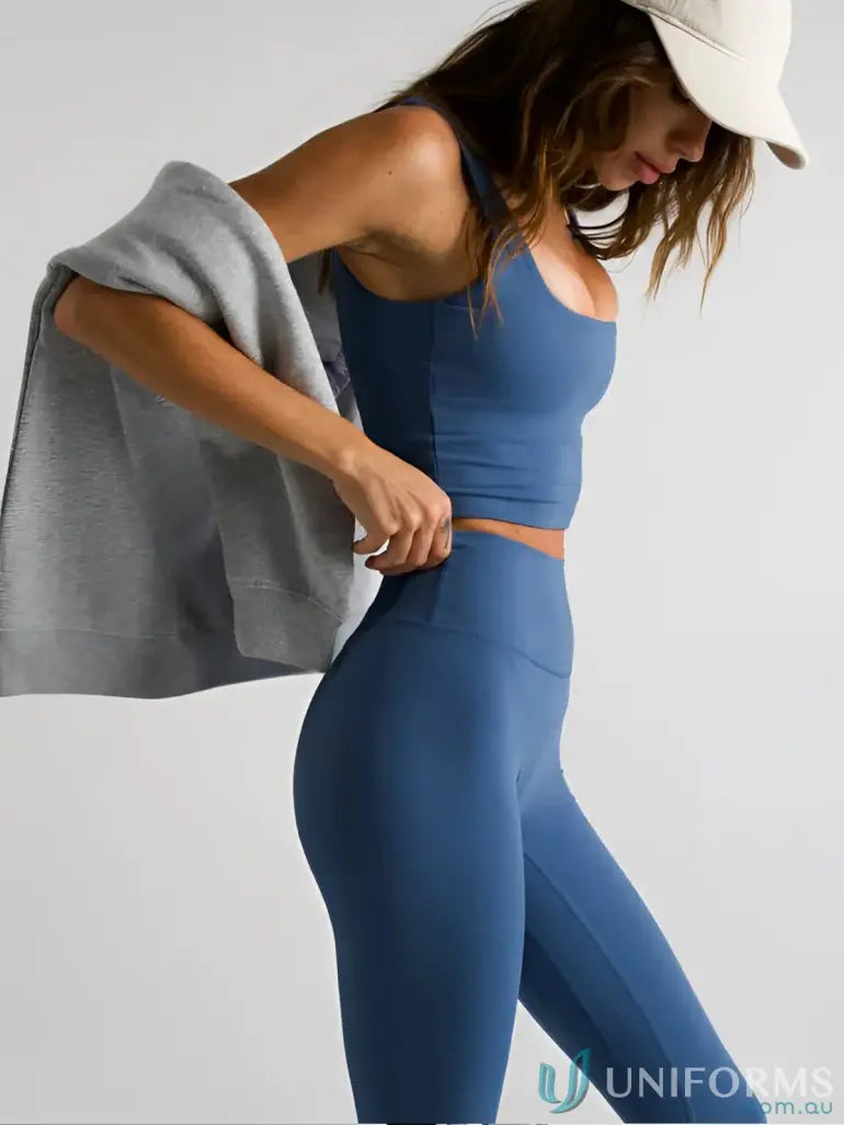 Blue athletic set with invisible scrunch for stylish uniforms and workwear comfort