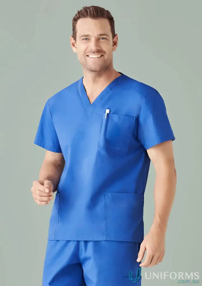 Smiling man in royal blue IOP EMB Unisex Scrub Top, perfect workwear for uniforms