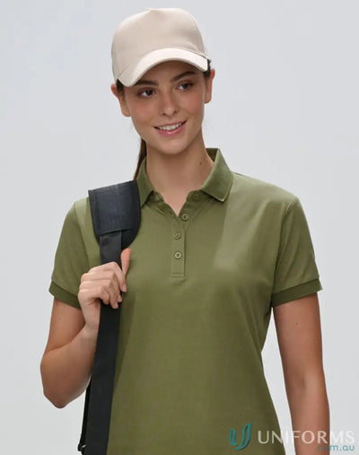 Woman wearing a khaki Jacquard 5-Panel Cap with polyester jacquard fabric