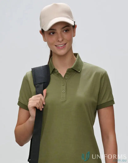 Woman wearing a khaki Jacquard 5-Panel Cap with polyester jacquard fabric