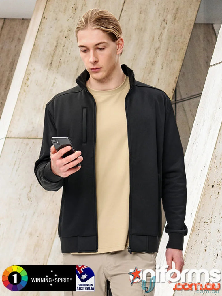 Young man in Jacquard Fleece Bomber Jacket with high zip-up neckline holding phone