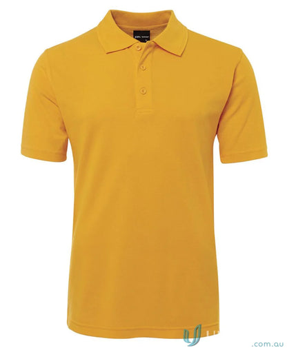 Mustard-colored JBs 210 Polo shirt with 210gsm pique fabric and herringbone tape