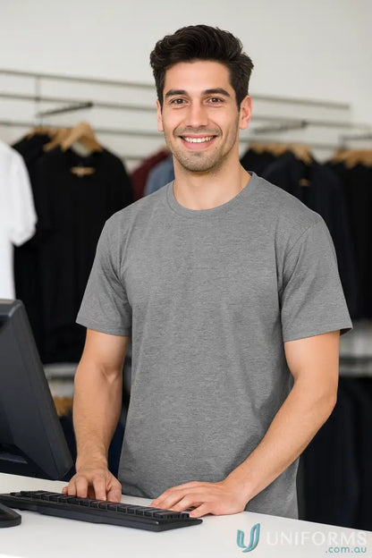 Smiling man in JB’s Adult 1HT Marle Tee crew neck classic fit jersey knit shirt