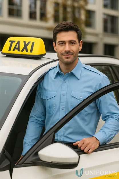 Man in JB’s Epaulette LS Shirt with button-down chest pockets next to white taxi