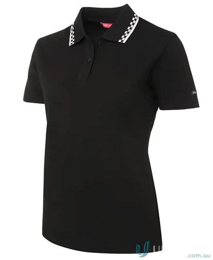 Black JB’s Ladies Chef Polo with checkered collar made of 210gsm double pique fabric