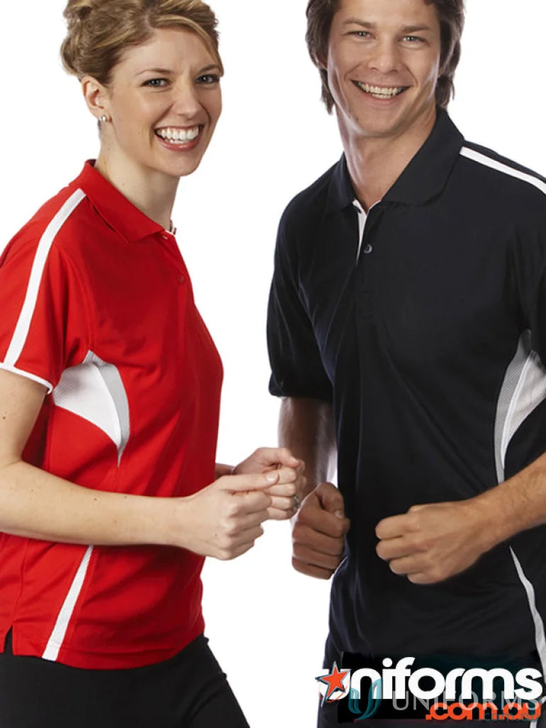 Two people wearing JB’s Podium Cool polo shirts with dual-color body panels and moisture-wicking tech