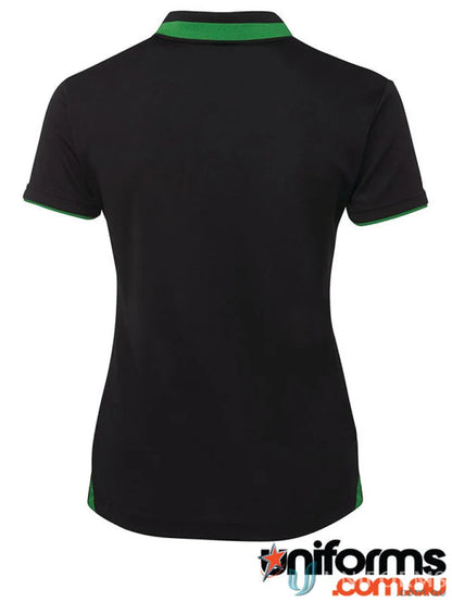 Black polo shirt with green trim from JB’S Podium Ladies Swirl Polo collection