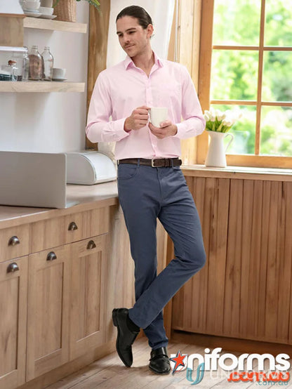 Man in pink shirt and blue Jean Style Flexi Chino Pants with jacquard weave
