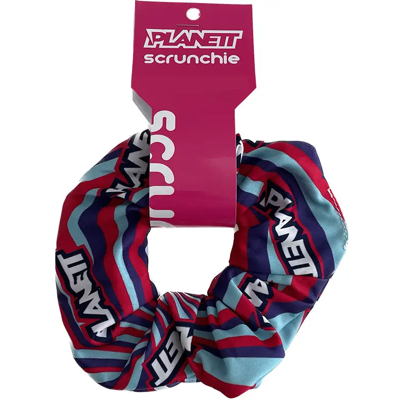 A jelly scrunchie with red navy and light blue stripes and bold white planet lettering perfect for work uniforms