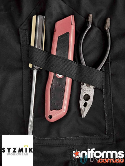Tools in a pocket of JHS Mens Tough Pant showcasing durable reinforced pocket design
