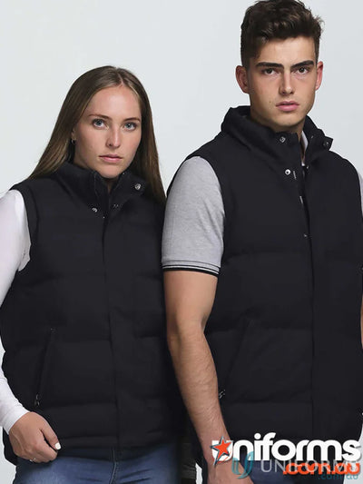 Two people hanging out in stylish black junction puffa vests for casual comfort