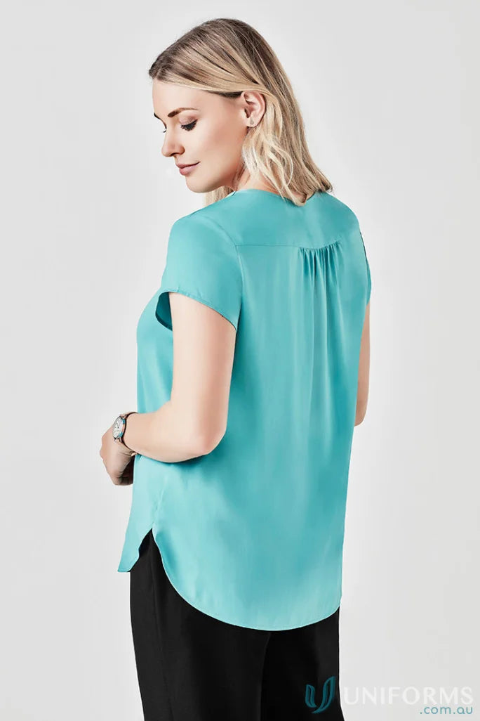 Woman in turquoise Kayla V-Neck Pleat Blouse RB967LS Biz Collection product shot