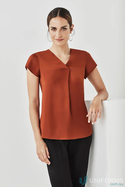 Woman’s rust-colored Kayla V-Neck Pleat Blouse RB967LS from Biz Collection