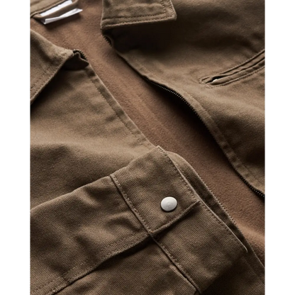 Keely canvas jacket in olive green with white buttons and pocket details