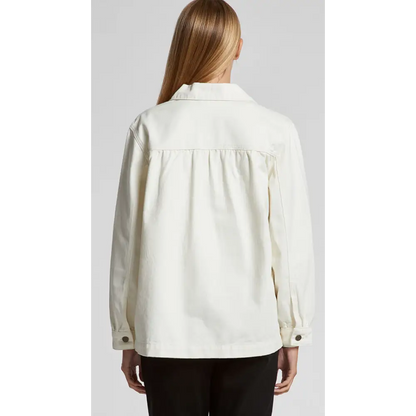 Keely denim jacket styled as white blouse with ruffled hem and button-down front