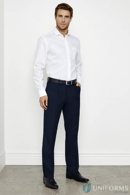 Man in white shirt and dark trousers wearing KENNARDS Mens Pleat Front Pant for a perfect fit and stretch