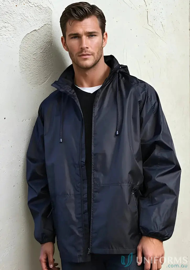 Man modeling KENNARDS Unisex Spinnaker Jacket in navy blue with contrast zippered design