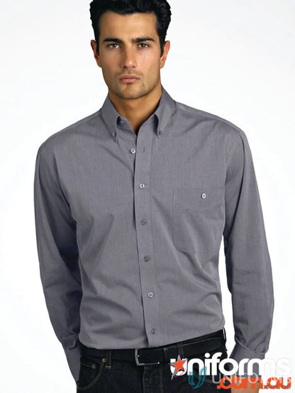 Man wearing Keval Men’s Long Style 264-JK long sleeve chambray shirt with dark jeans
