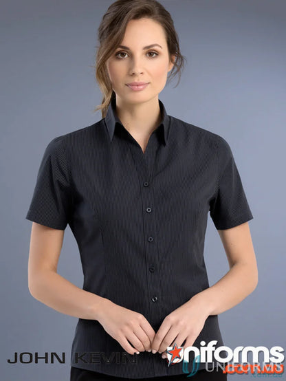 A woman wearing a Keval Slim Fit SS Dark Stripe shirt with subtle vertical stripes