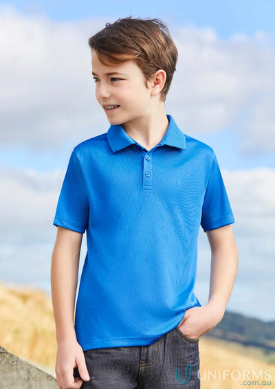 Kids Action Polo boy’s blue polo shirt made from breathable sports knit for school uniforms
