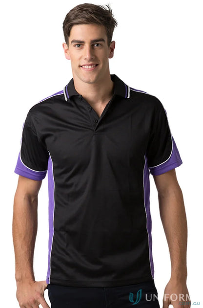 Man wearing Kids Auburn Polo with cooldry moisture management tech for all-day coolness