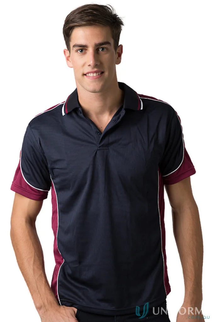 Boy in Kids Auburn Polo shirt showcasing cooldry moisture management technology