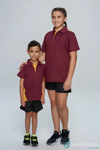 Kids Paterson Polo uniforms with button placket, worn by two kids in matching maroon and gold shirts