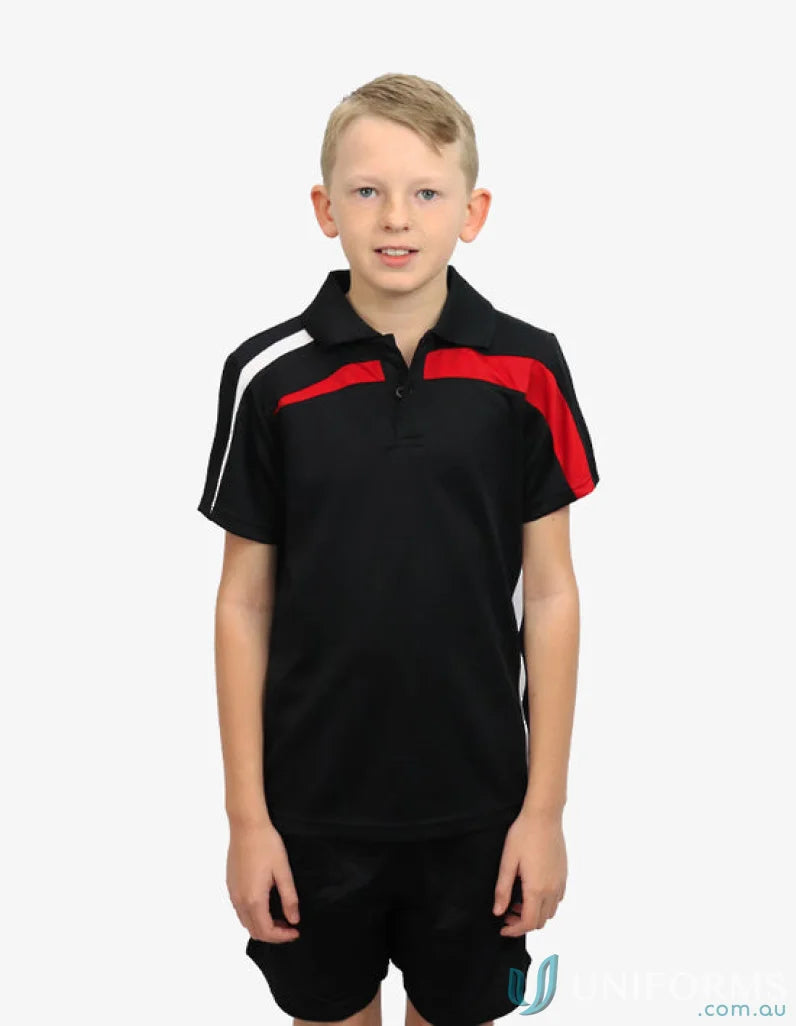 Boy wearing Kids Planett Polo with cooldry moisture management tech in black, red, white