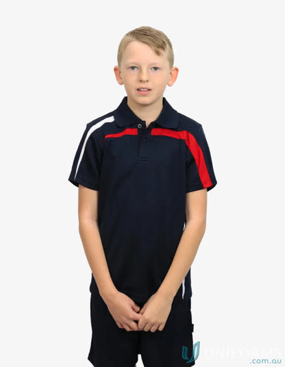 Boy wearing Kids Planett Polo with cooldry moisture management technology