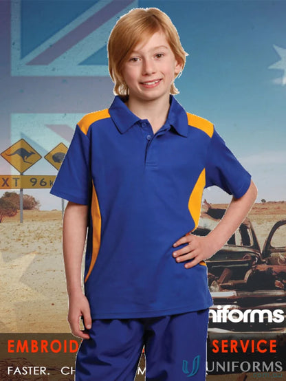 Smiling kid in Kids TrueDry Winner contrast short sleeve polo showing team’s image