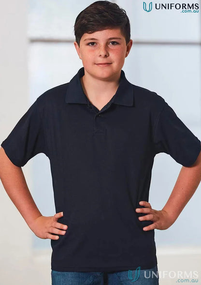 Cute kid wearing Kids Verve Polo in navy blue with jeans, perfect for stylish kids sets