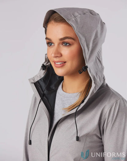 Lady wearing Ladies Absolute Waterproof Performance Jacket, stay stylish in rain