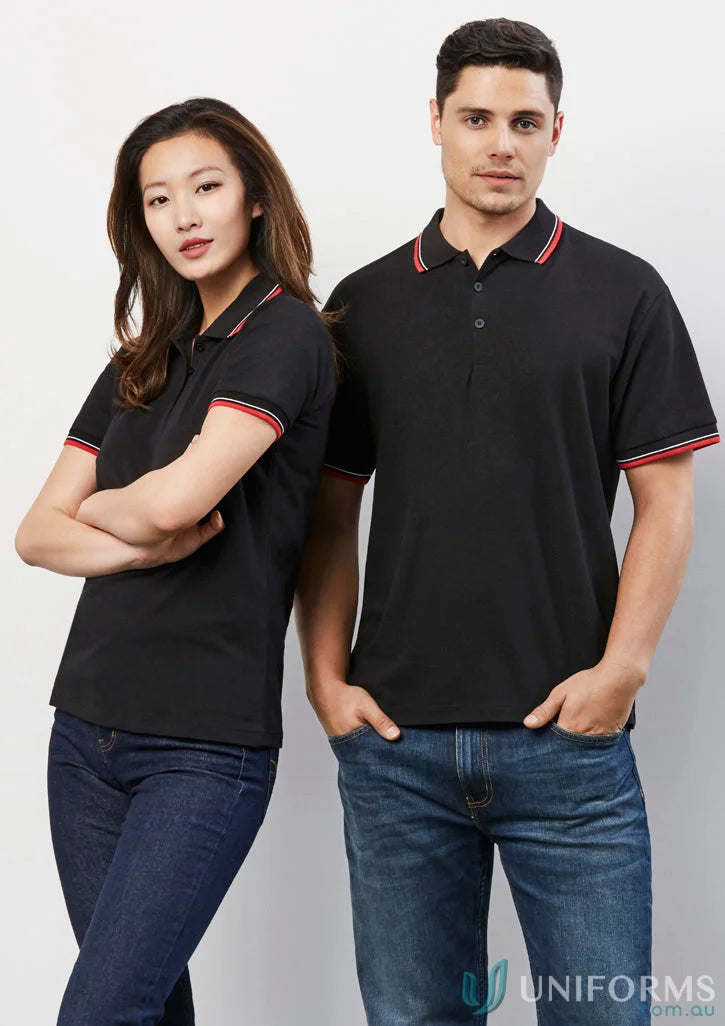 Ladies Cambridge Polo from Biz Collection Ladies, black short sleeve polo shirts with red and white trim worn by a man and woman