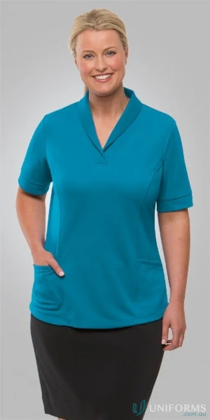 Woman in teal roll collar workwear top and black skirt, perfect for ladies city uniforms
