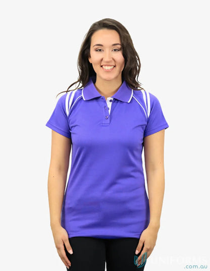 Woman wearing a purple Ladies Cobra SS Polo with CoolDry moisture management tech