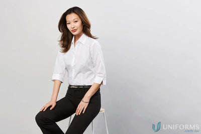 Businesswoman in a stylish work shirt cotton poplin from biz collection ladies