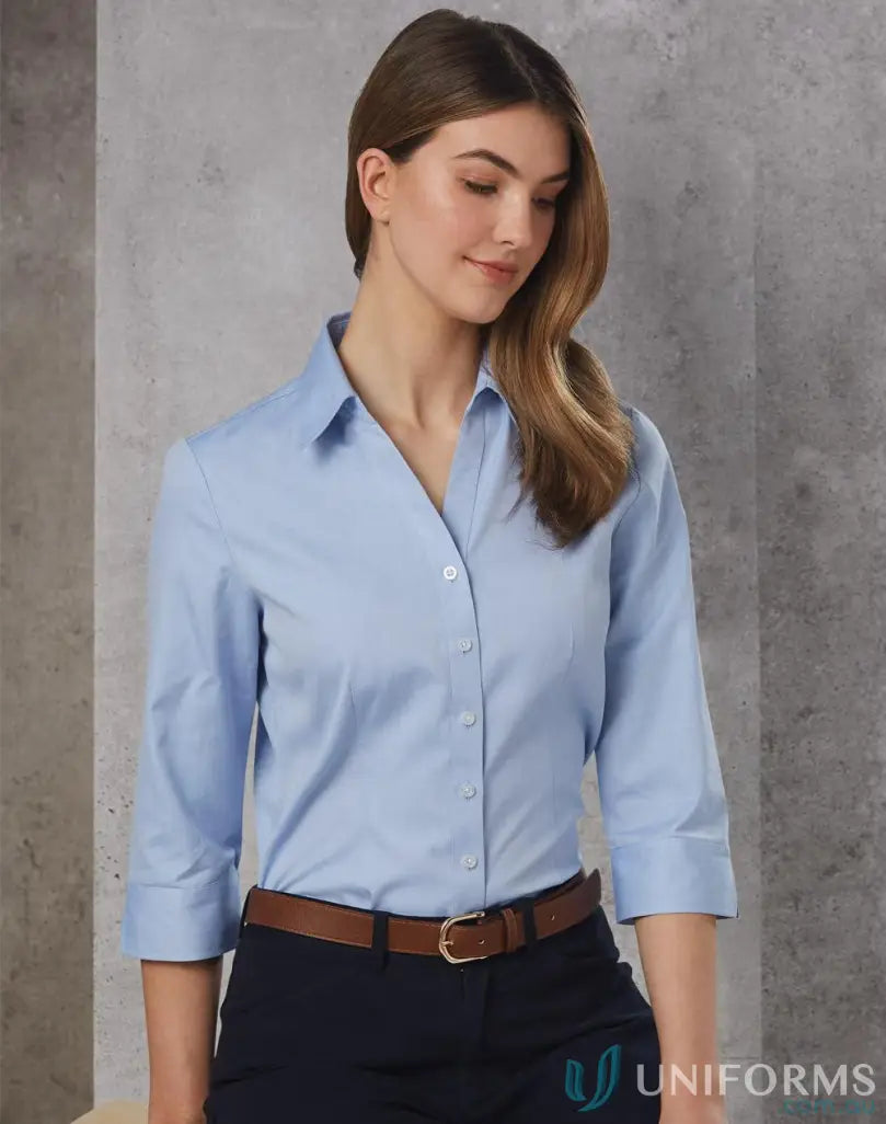 Light blue Ladies CVC Oxford 3Qtr Shirt with collar and V-neck for a winning spirit ladies vibe