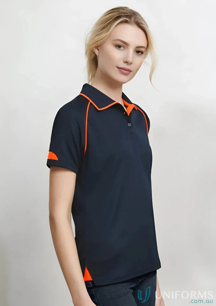 Lady wearing navy blue Ladies Fusion Polo from Biz Collection Polo with modern fit