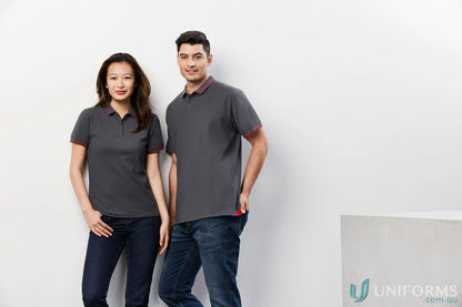 Matching gray short sleeve polo shirts with red trim from Ladies Jet Collection P226LS worn by a man and woman