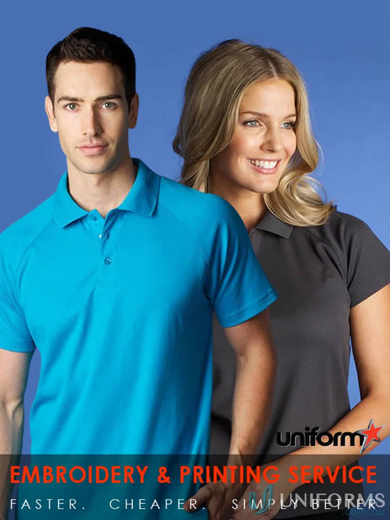 Two people wearing Ladies Keira Polo work uniforms for a professional look