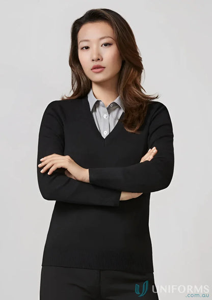 Woman wearing black knit pullover, ladies knit pullover, perfect for casual style