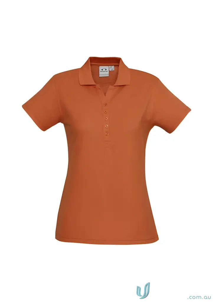 Ladies Talon Short Krue Polo in burnt orange, perfect for workwear game