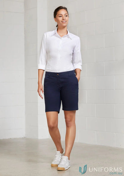 Woman in navy LAWSON CHINO SHORTs and white shirt, part of Bs021L Biz Collection