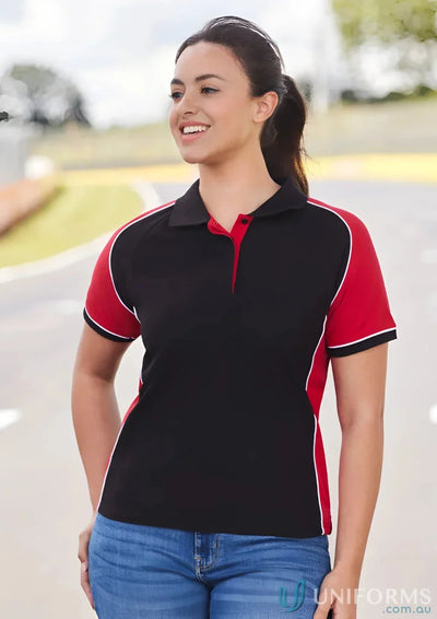 Ladies Nitro short sleeve polo in black with red side panels and white piping