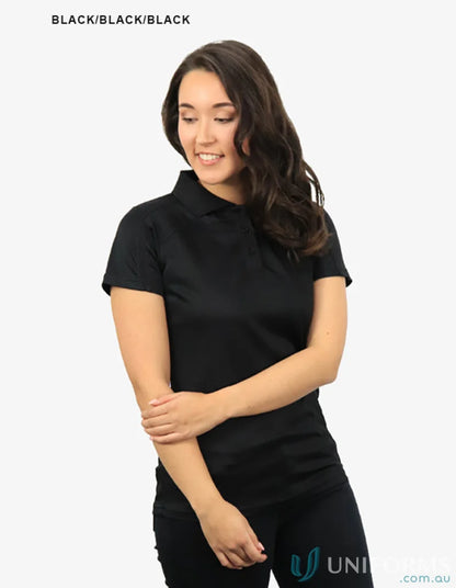 Lady wearing Ladies Planett Polo with cooldry moisture management tech bsp2014l